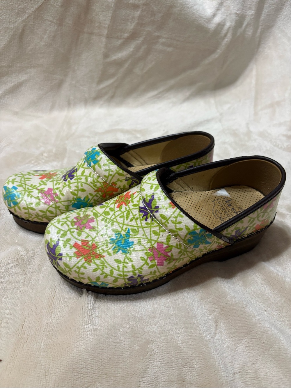 Dansko Women's Floral Mules in White with Multicolor Flowers